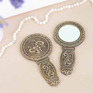 Зеркало с ручкой 1 7,515